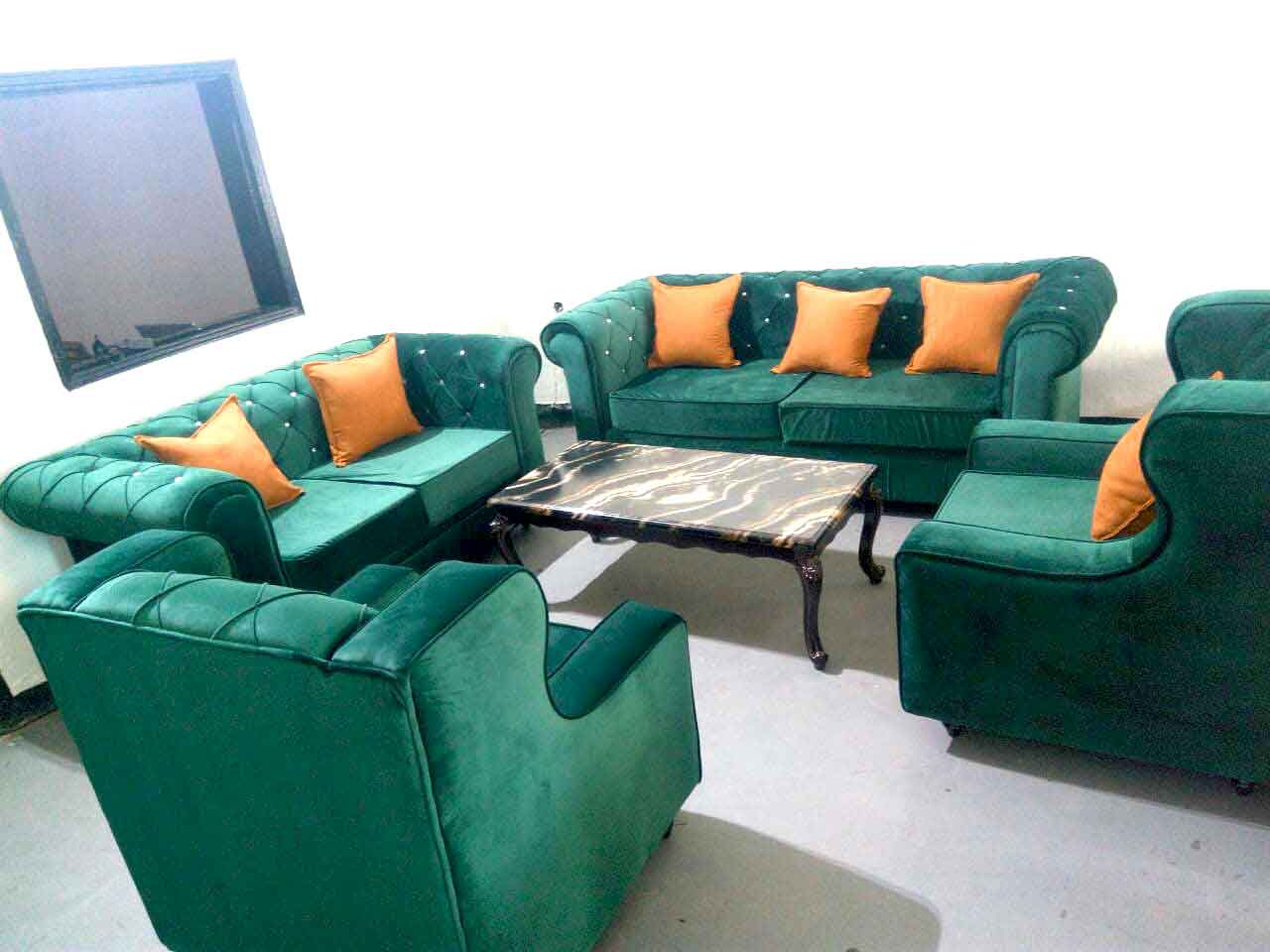 Classic Green Velvet Chesterfield Sofa with Yellow Pillows